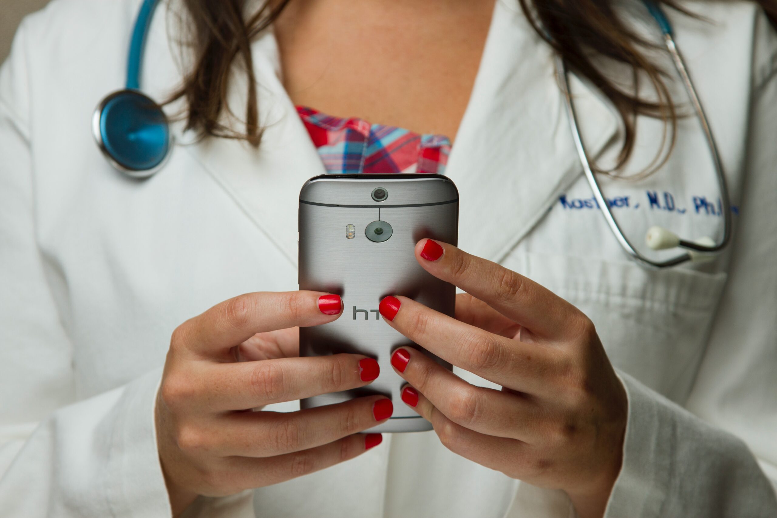 Image of doctor using mobile device